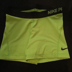 Neon green Nike Pro 3” compression shorts